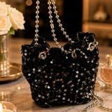 Cartera de terciopelo con lentejuelas