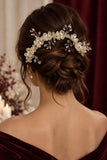 Tiara o diadema de flores perladas y piedras