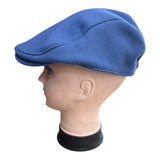 Boina con visera de tela liso paño .