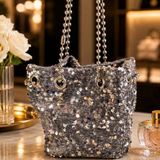 Cartera de terciopelo con lentejuelas