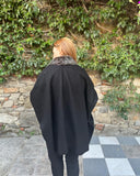 Capa de paño